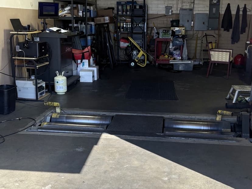 Smog inspection bay and testing equipment at In & Out Smog Check